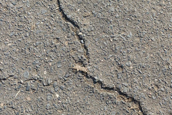 Argilla grigia, muro di cemento con crepe — Foto Stock