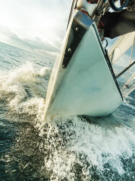 Yachting on sail boat bow stern shot splashing water — Stock Photo, Image