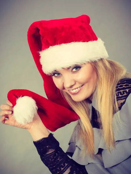 Happy woman wearing Santa Claus helper hat — Stock Photo, Image