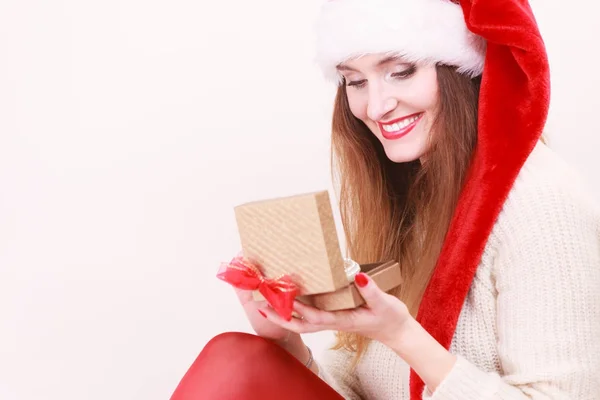 Woman opening gift box. Christmas time — Stock Photo, Image