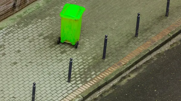Plastic wheely bin in the street outside — Stock Photo, Image