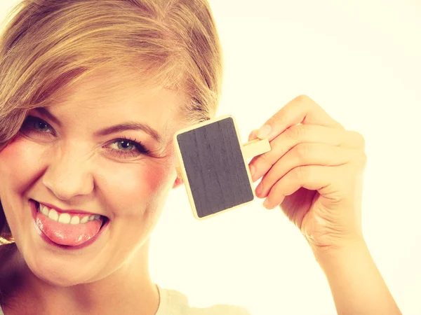 Teenage girl holding little school blackboards — Stock Photo, Image