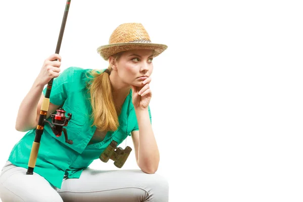 Femme ennuyée avec canne à pêche, équipement de filature — Photo