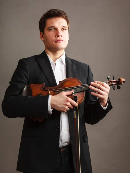 Mann kledd elegant med fiolin – stockfoto