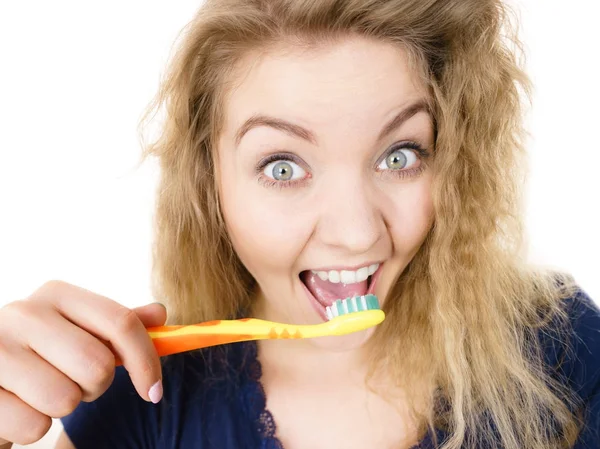 Happy positive woman brushing teeth, isolated — Stock Photo, Image