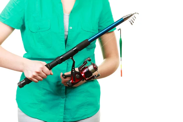 Person holding fishing rod, spinning equipment. — Stock Photo, Image