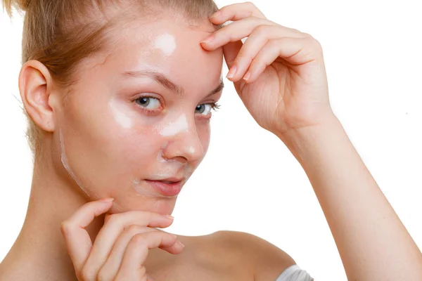 Woman in facial peel off mask. — Stock Photo, Image