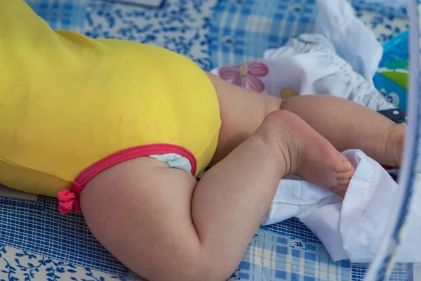 Little baby wearing swimsuit and diaper — Stock Photo, Image