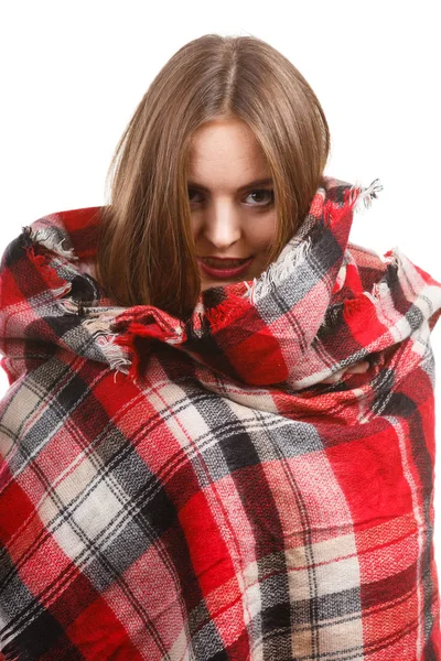 Woman wearing warm scarf warming herself up — Stock Photo, Image