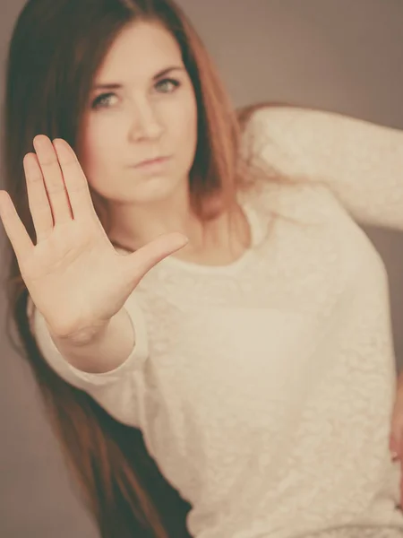 Angry apodicticity woman showing stop with hand — Stock Photo, Image