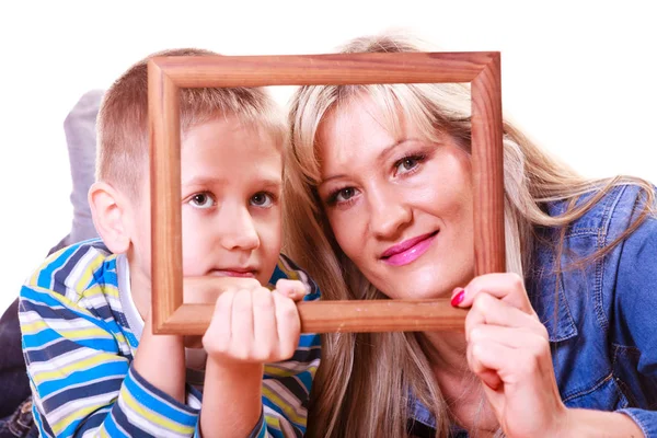 Mother and son play with empty frame. — Stock Photo, Image