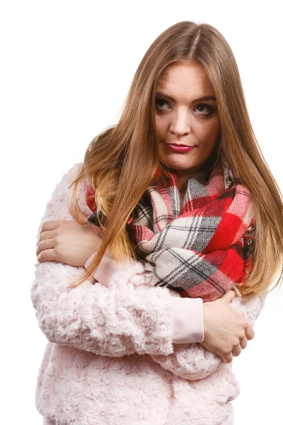 Grumpy woman feeling cold wearing warm scarf — Stock Photo, Image