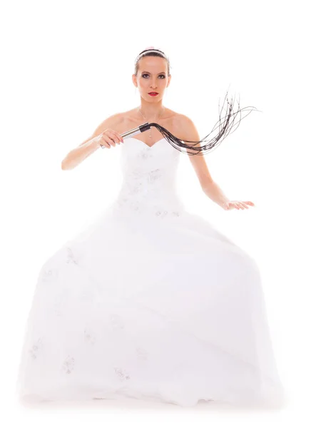 Bride white gown holds black leather flogging whip — Stock Photo, Image