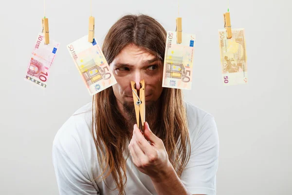 Young man sick of money — Stock Photo, Image