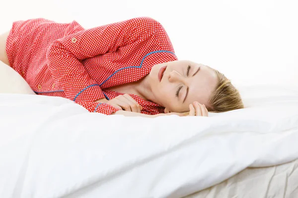 Woman sleeping in bed on the side — Stock Photo, Image