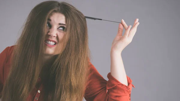 Woman having tangled hair — Stock Photo, Image