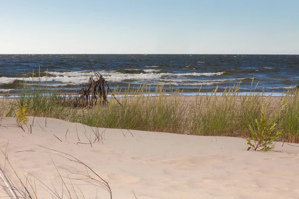 Sandy beach dunes and sea water — Stock Photo, Image