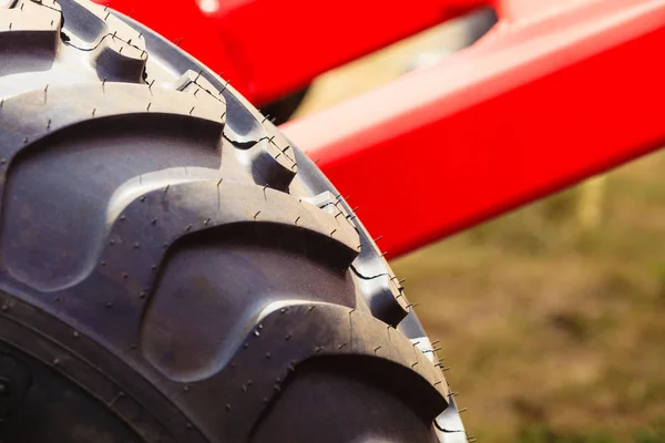 Detailed closeup agricultural machinery, big tires — Stock Photo, Image