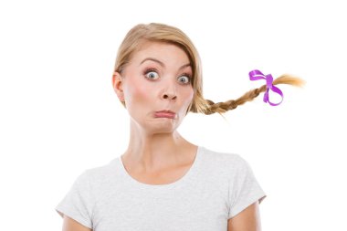 Teenage girl in braid hair making funny face clipart