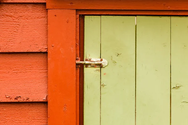 Big green oldfashioned wooden doors in house — Stock Photo, Image