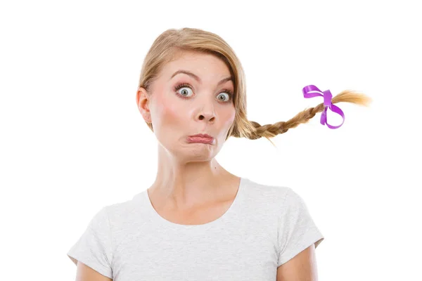 Teenage girl in braid hair making funny face — Stock Photo, Image