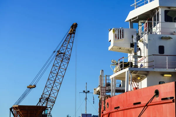 Crane in ship dock vessel — Stock Photo, Image