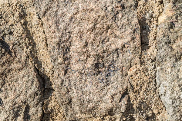 Detailed closeup of brown stone rock texture — Stock Photo, Image