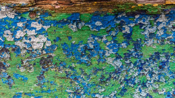 Närbild av färg fläckar på träskiva — Stockfoto