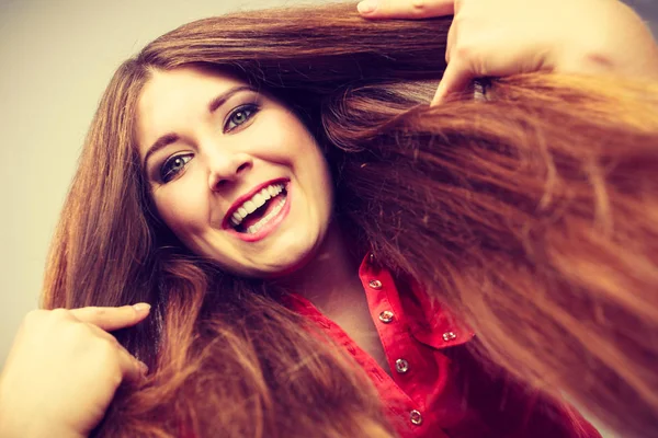 Happy positive woman with long brown hair — Stock Photo, Image