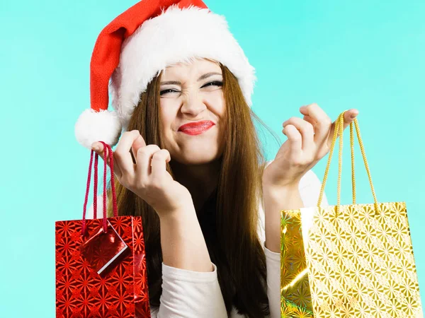 Happy Christmas woman holds gifts bag — Stock Photo, Image