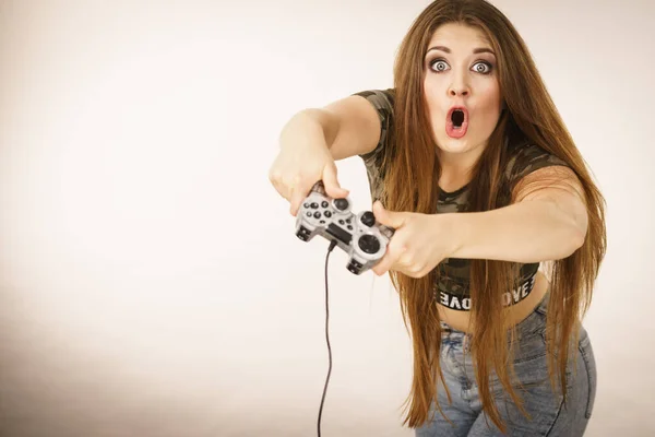 Gamer woman holding gaming pad