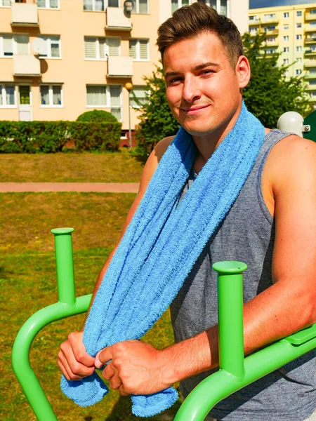 Young man relaxing after outdoor workout — Stock Photo, Image