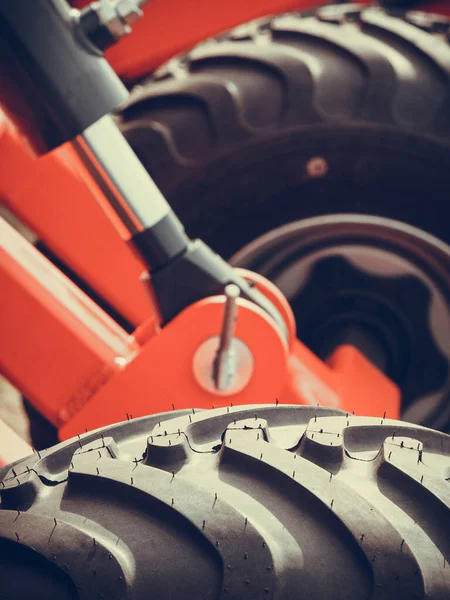 Detailed closeup agricultural machinery, big tires — Stock Photo, Image