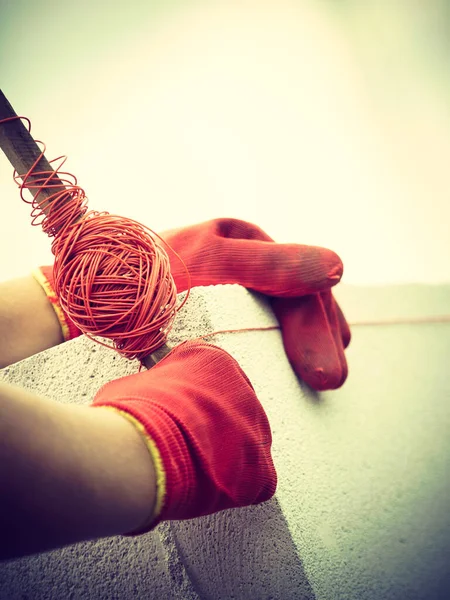 String net on stick, spirit level — Stock Photo, Image