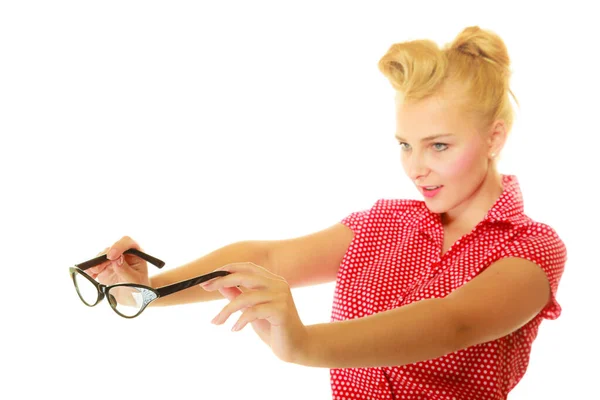 Blonde pin up girl holding retro glasses — Stock Photo, Image