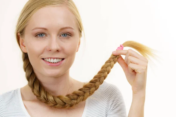 Blonde girl with long braid hair — Stock Photo, Image