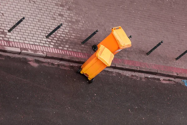 Plastic wheely bins in the street outside — Stock Photo, Image