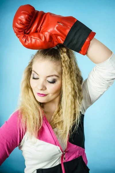 Funny girl in red gloves playing sports boxing — Stock Photo, Image