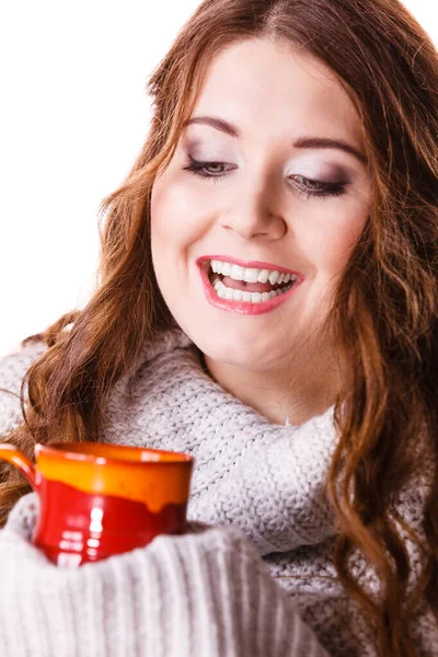 Woman holding red tea coffee mug — Stock Photo, Image