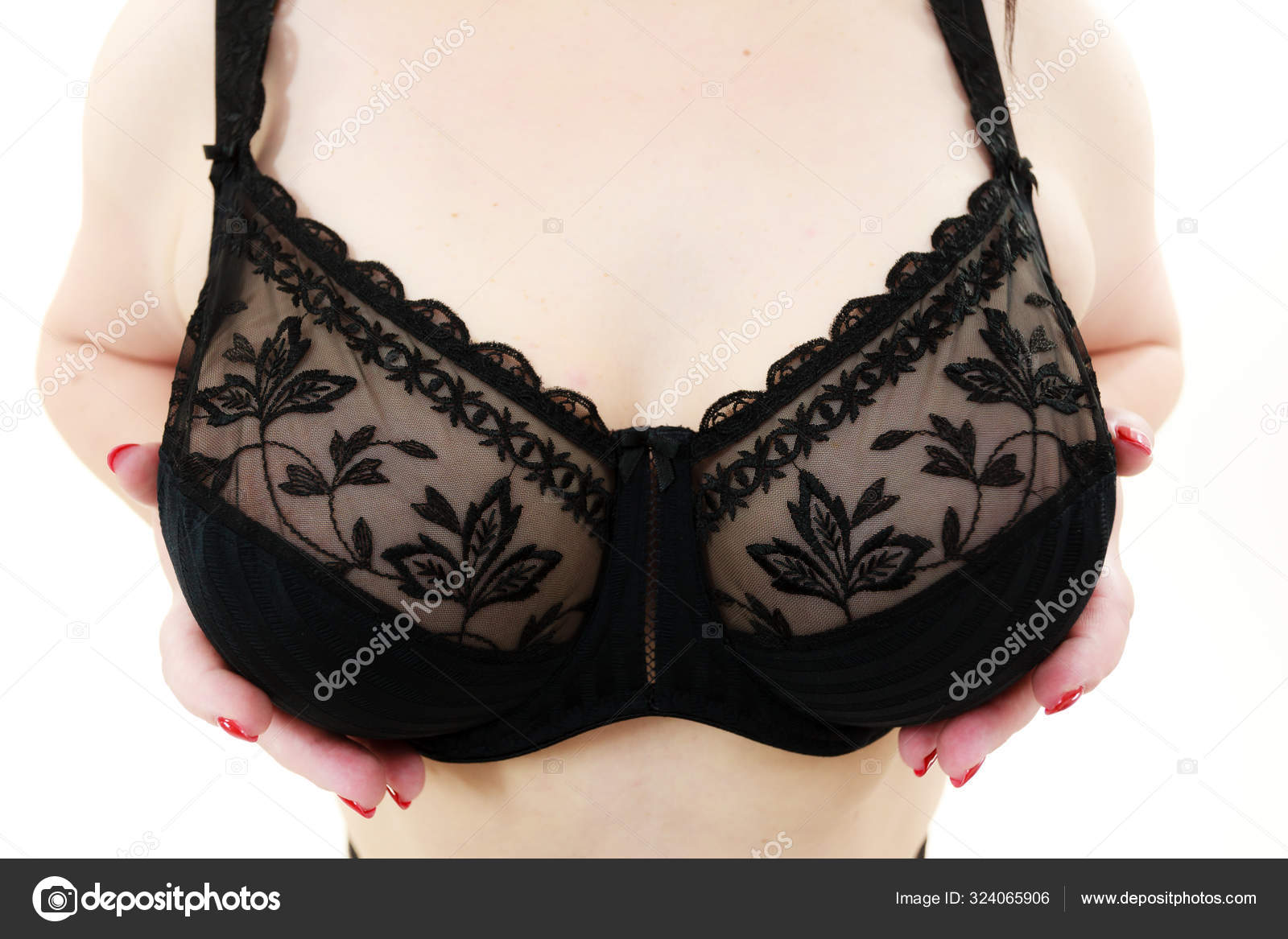 Woman big breast wearing bra Stock Photo by ©Voyagerix 324065906