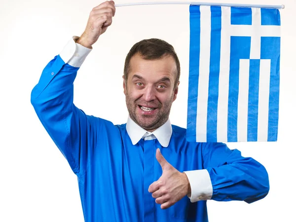 Счастливый человек с греческим флагом — стоковое фото