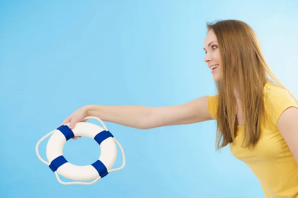 Girl holds life buoy rescue ring — Stock Photo, Image