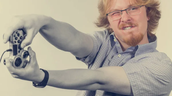 Gamer man holding gaming pad — Stock Photo, Image