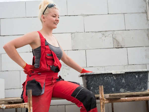 Female builder working build new house — Stock Photo, Image