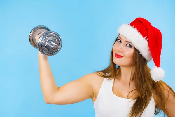 Papai Noel mulher levantando halteres — Fotografia de Stock