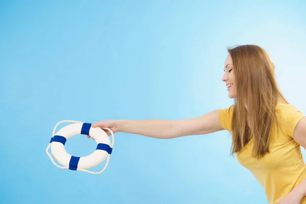 Girl holds life buoy rescue ring — Stock Photo, Image