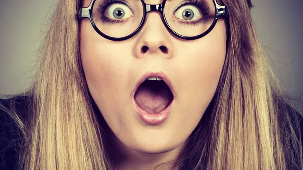 Closeup woman shocked face with eyeglasses — Stock Photo, Image