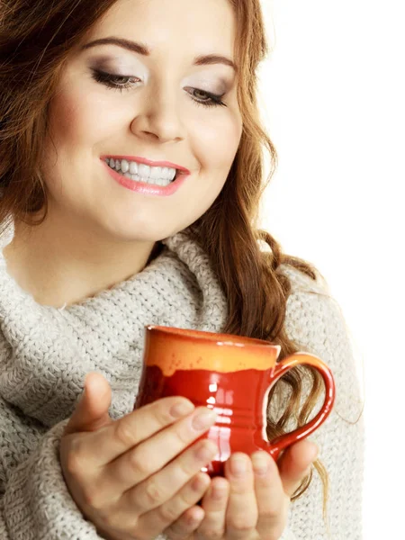 Woman holding red tea coffee mug — Stock Photo, Image
