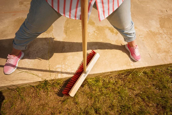 Person Using Big Broom Clean Backyard Patio Housecare Duties Concept — Stock Photo, Image