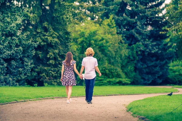Back View Couple Walking Beautiful Park Summer Weather Holding Hands Stock Image